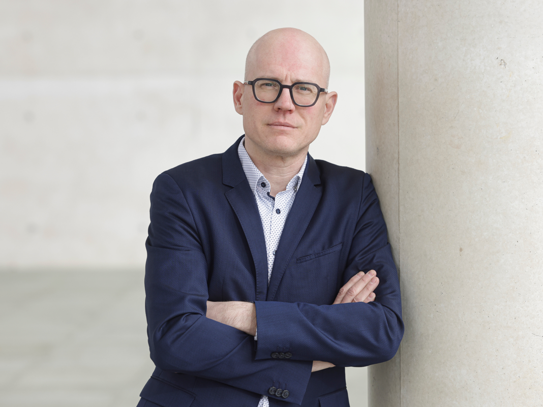 Syspro - Stärkeres Engagement für den Wohnungsbau gefordert Dr.-Ing. Thomas Kranzler Geschäftsführer des Syspro-Gruppe Betonbauteile e.V. blickt in die Kamera