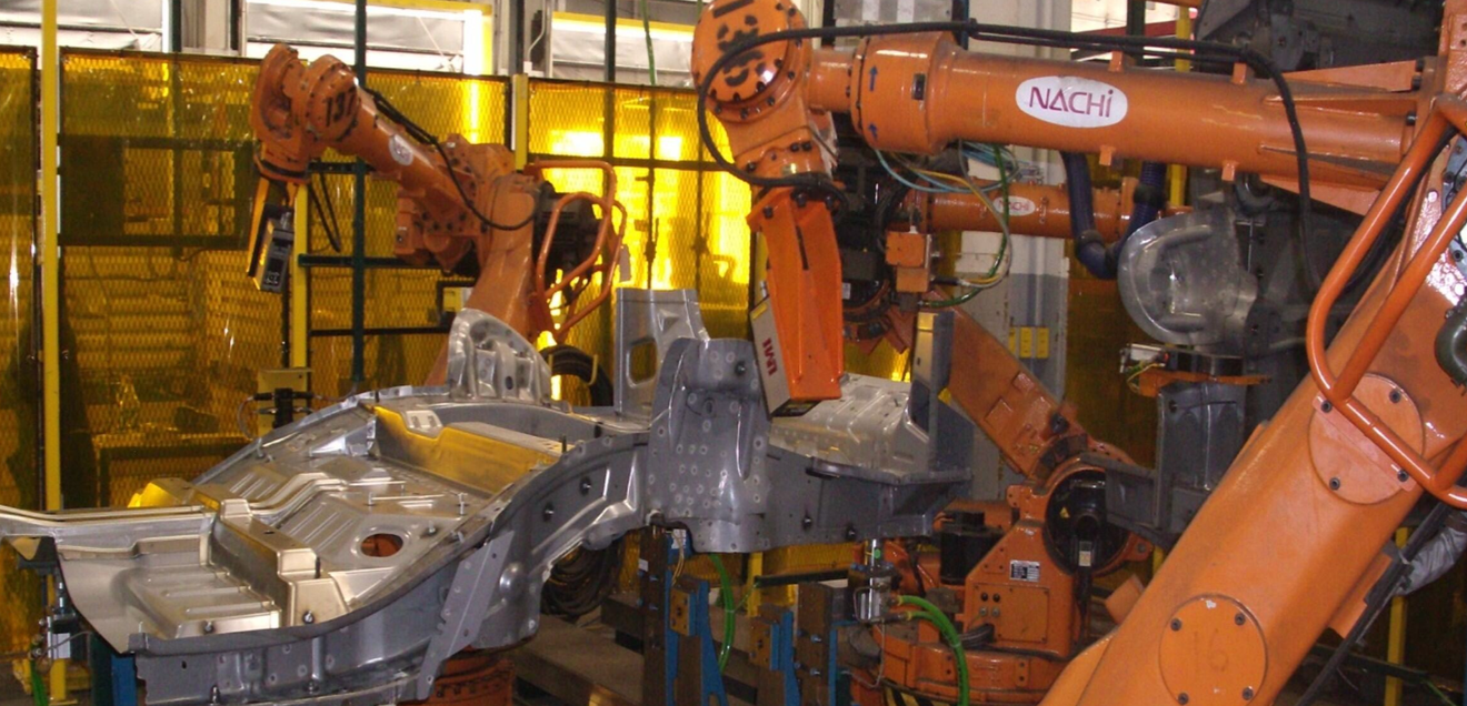Quality control in production: Two robots inspect car floor pans fully automatically Two robots carry out the inspection process.