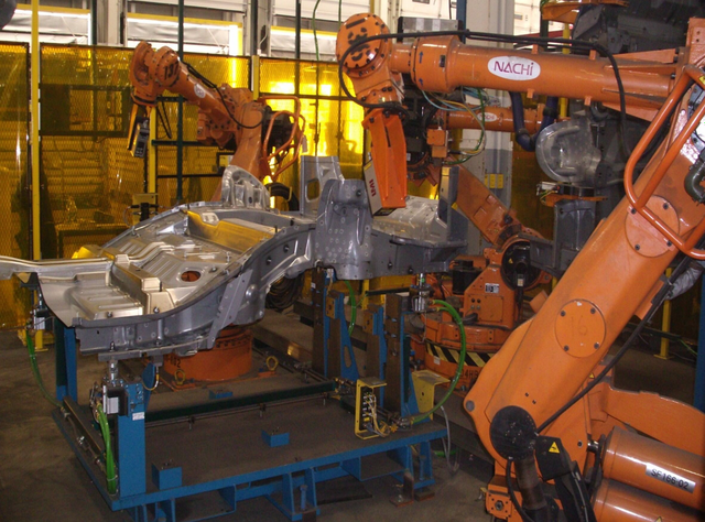 Two robots carry out the inspection process.