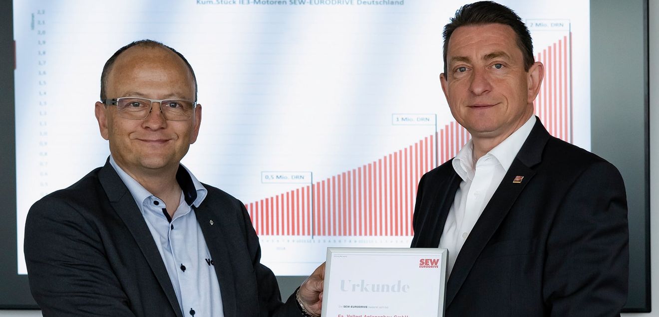 IE3 energy-saving motors from SEW: The success story of energy-saving motors continues Handover of the ten millionth DRN.. engine