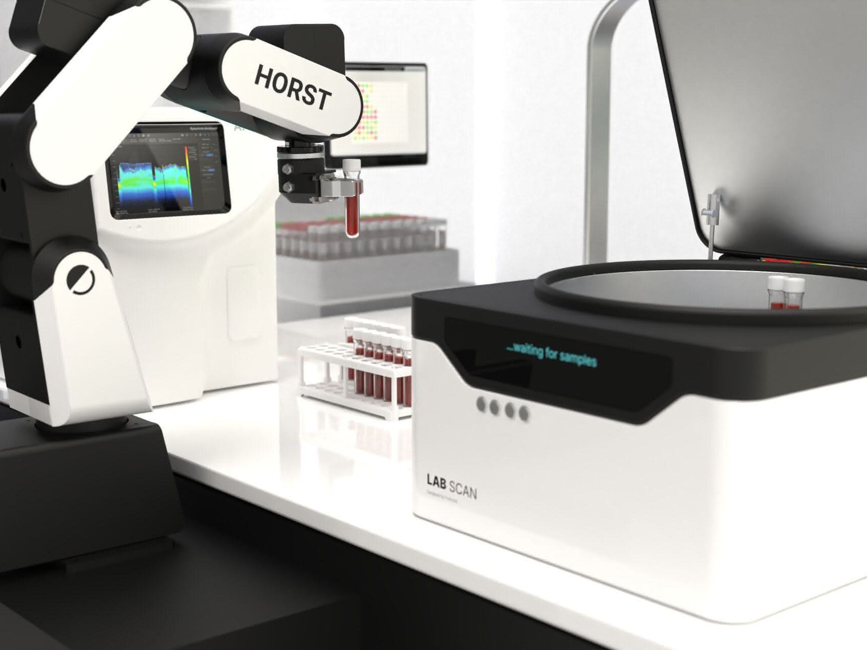 Der Roboter entnimmt ein Probenröhrchen und übergibt es an ein „LabScan“-System zur Analyse.