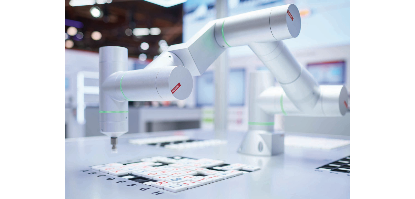 Taking automation to the next level with natural language - Beckhoff at the Hannover Messe Robot arm lays letters: Beckhoff Hannover Messe 2026