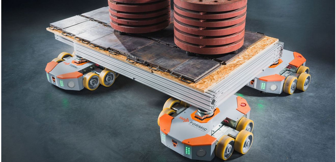 Schwerlasttransport: Schwarmbetrieb von AGVS Schwerlasttransport: Schwarmbetrieb von AGVS