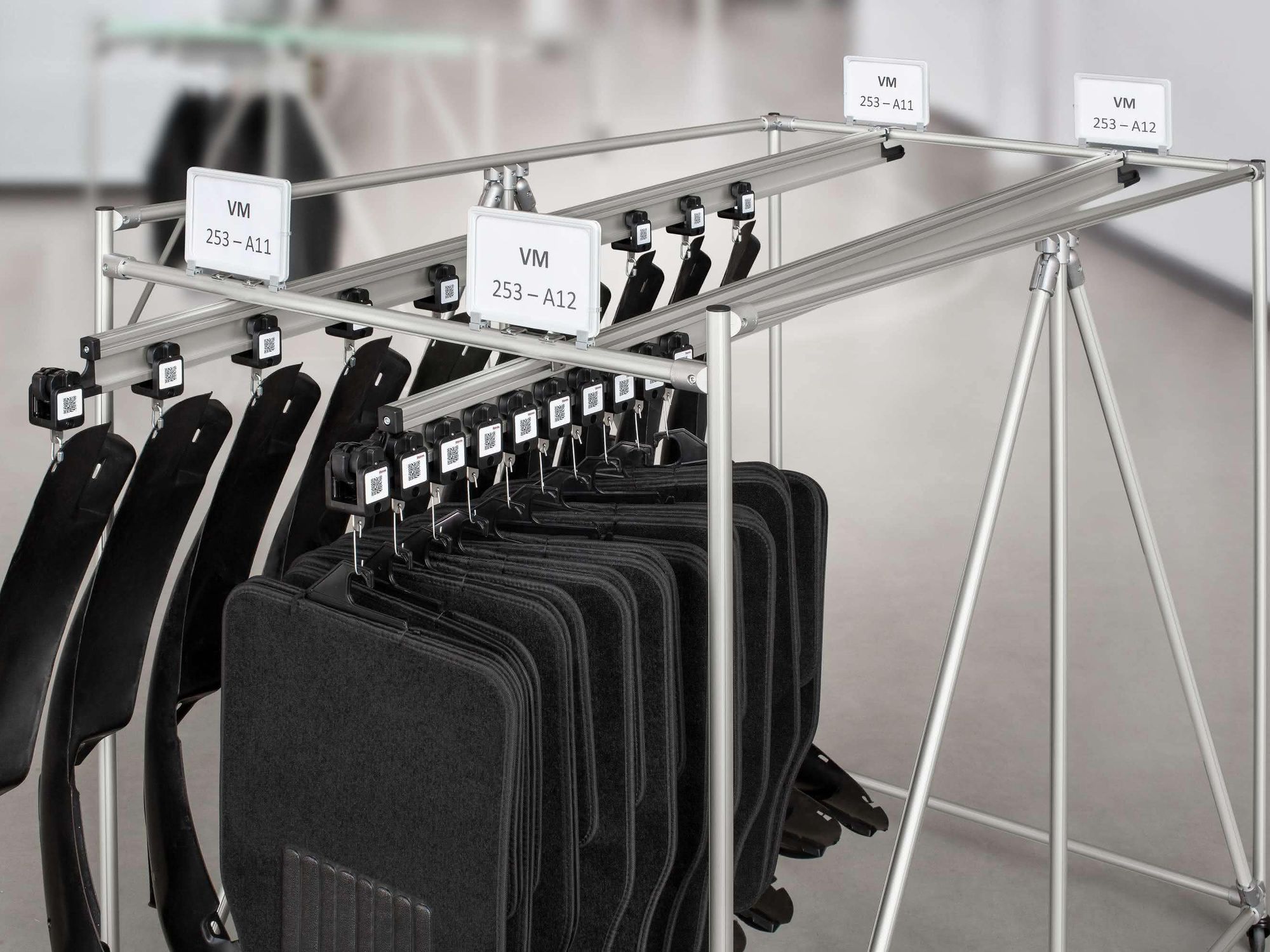 Overhead conveyor system: Material supply by gravity Overhead conveyor system