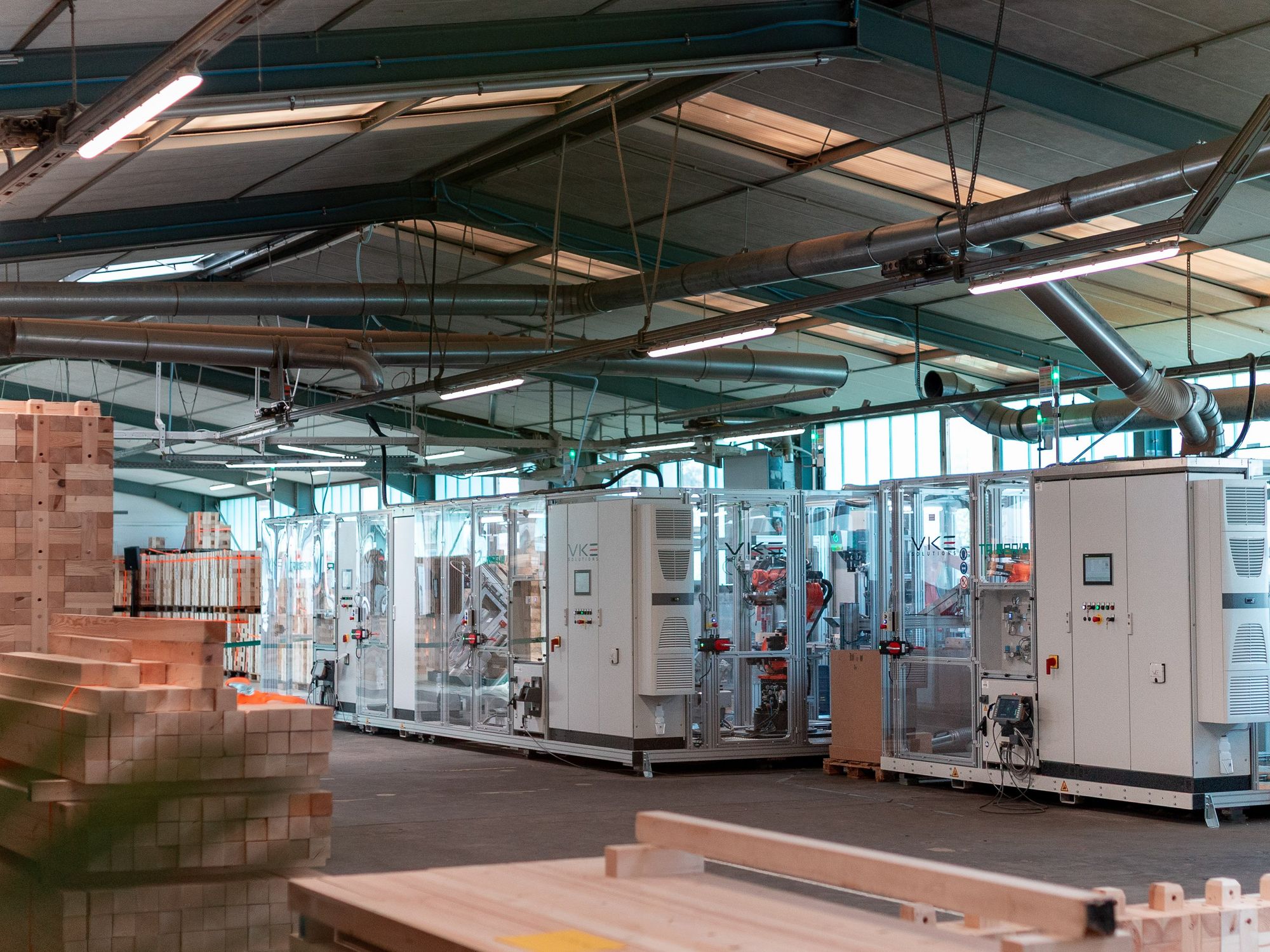 Vollautomatisierte Produktionslinie für Triqbriq-Holzbausteine