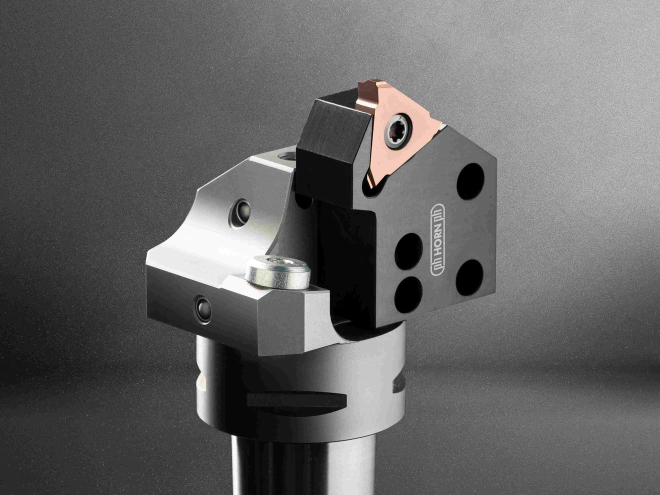 High performance in hardened steels: For the tough cases: Newly developed cutting material grade