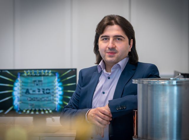The first university AI chip was created at TUM. In the picture: Prof. Hussam Amrouch next to his AI chip (magnified 2000 times) The first university AI chip was created at TUM. In the picture: Prof. Hussam Amrouch next to his AI chip (magnified 2000 times)
