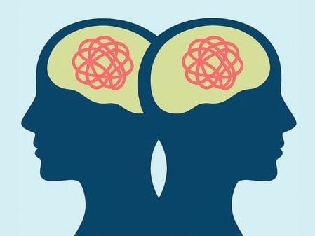 Protein DISC1: Neue Erkenntnisse zur Entstehung von Schizophrenie Darstellung von zwei abstrakten Köpfen mit Knoten im Kopf als Symbolbild