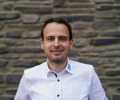 Andre Vogt lächelt freundlich in die Kamera Andre Vogt lächelt freundlich in die Kamera