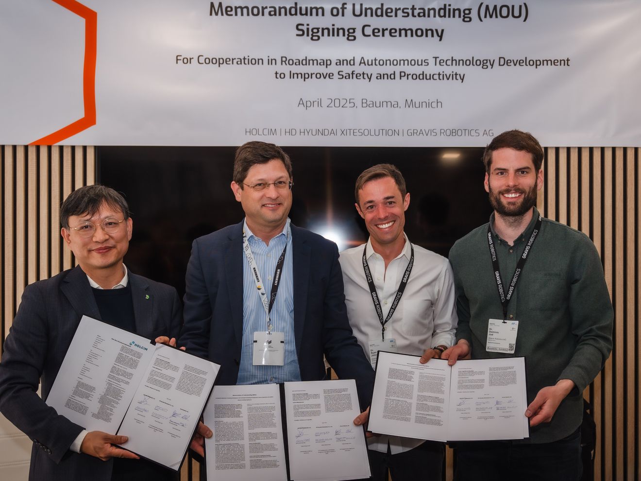 HD Hyundai, Develon, Holcim und Gravis Robotics: Intelligente Baustellen