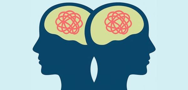 Protein DISC1: Neue Erkenntnisse zur Entstehung von Schizophrenie Darstellung von zwei abstrakten Köpfen mit Knoten im Kopf als Symbolbild