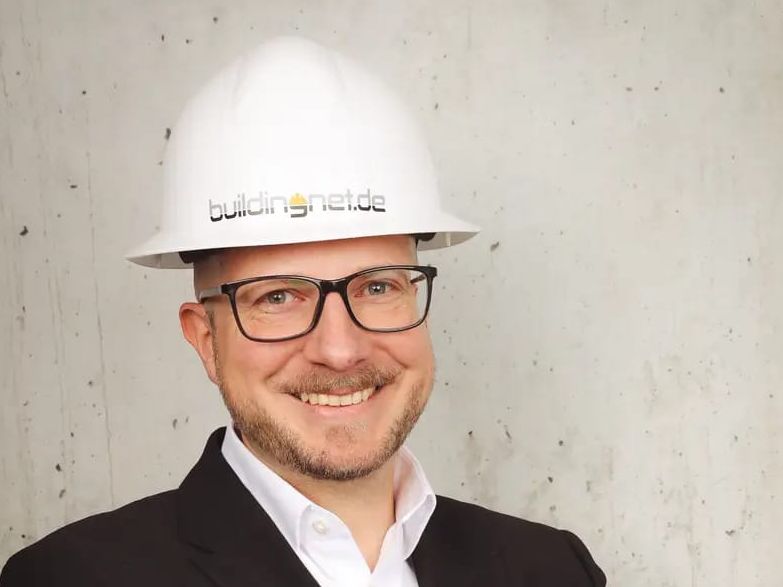 Baugewerbe-Chefredakteur Kai Ingmar Link Baugewerbe-Chefredakteur Kai Ingmar Link lächelt in die Kamera