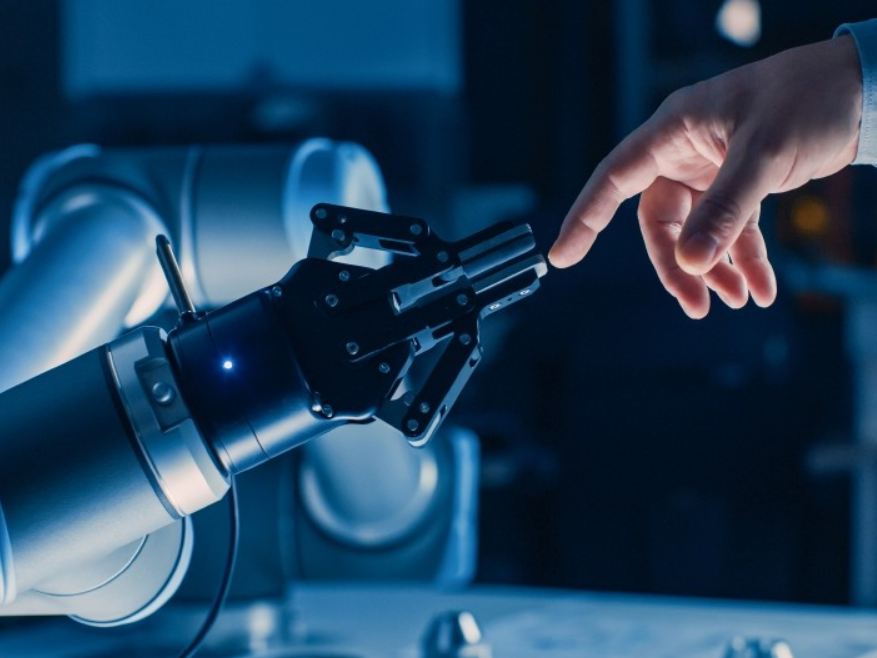 Robotic arm as a symbolic image for Rohde &amp; Schwarz at productronica 2025