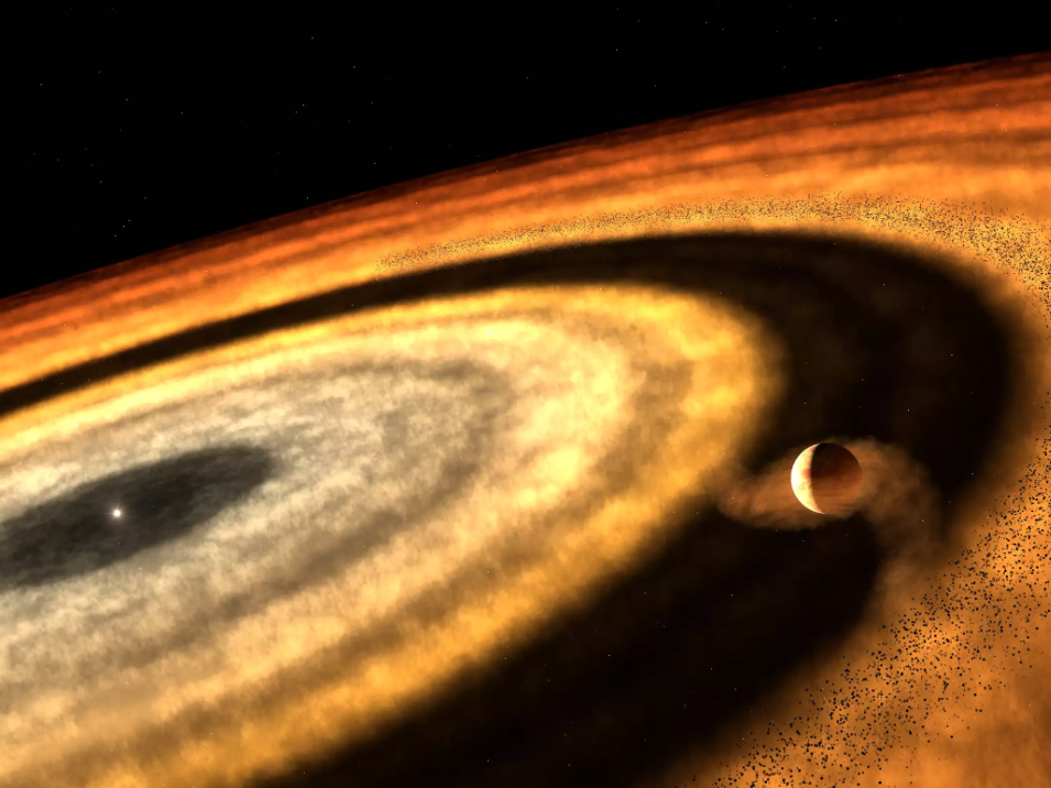 Wie Planeten entstehen Künstlerische Darstellung einer planetenbildenden Scheibe deutet eine ringförmige Struktur aus Gas und Staub an