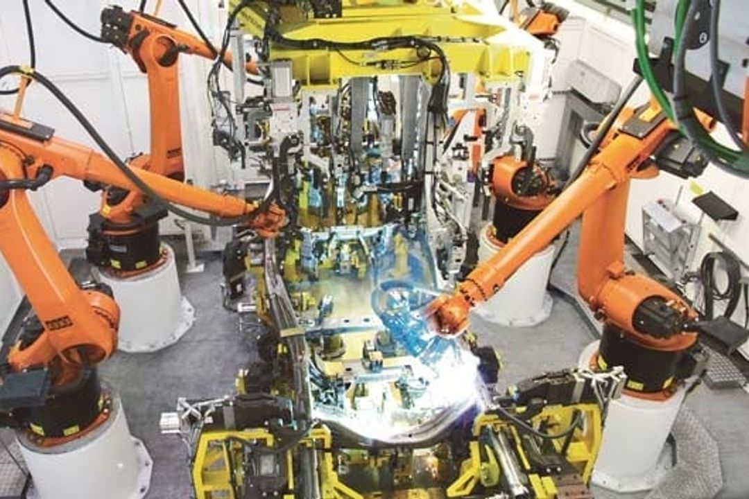 A_Industrial robot at work A_Industrial robot at work