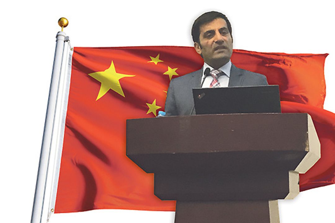 Rahman Jamal with Chinese flag Rahman Jamal with Chinese flag