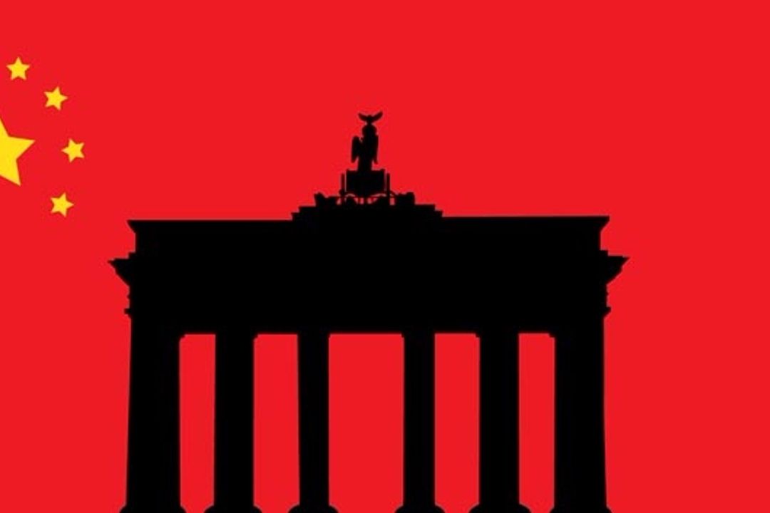 Brandenburg Gate as the background of the China flag Brandenburg Gate as the background of the China flag