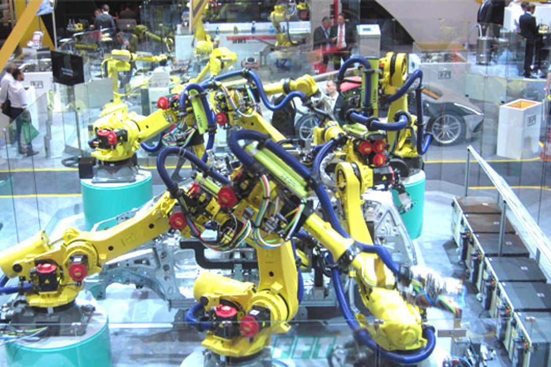Synchronized collaboration of classic industrial robots Synchronized collaboration of classic industrial robots