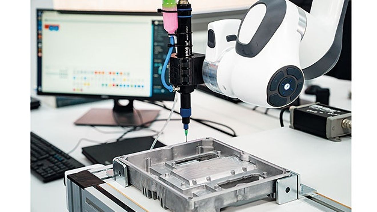 Cobots automate electronics function tests Cobots automate electronics function tests