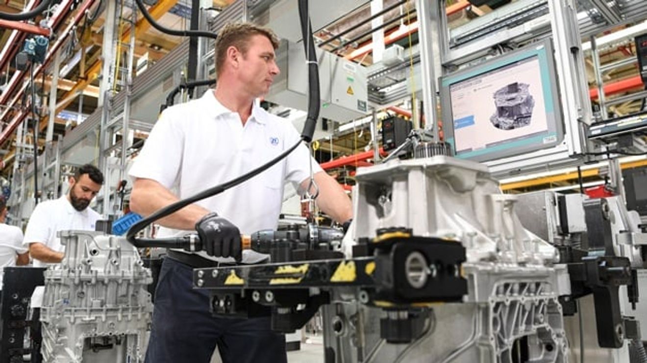 ZF Friedrichshafen employees build transmissions into a bus ZF Friedrichshafen employees build transmissions into a bus