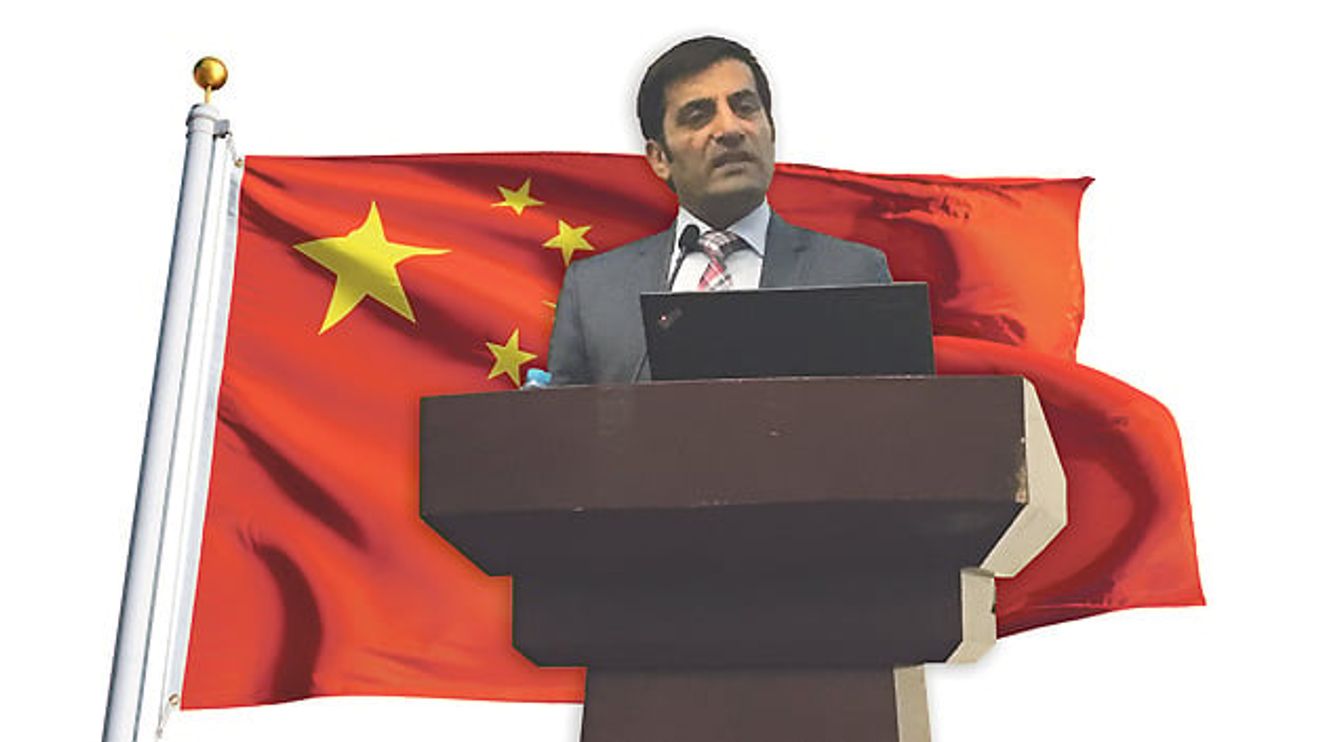 Rahman Jamal with Chinese flag Rahman Jamal with Chinese flag