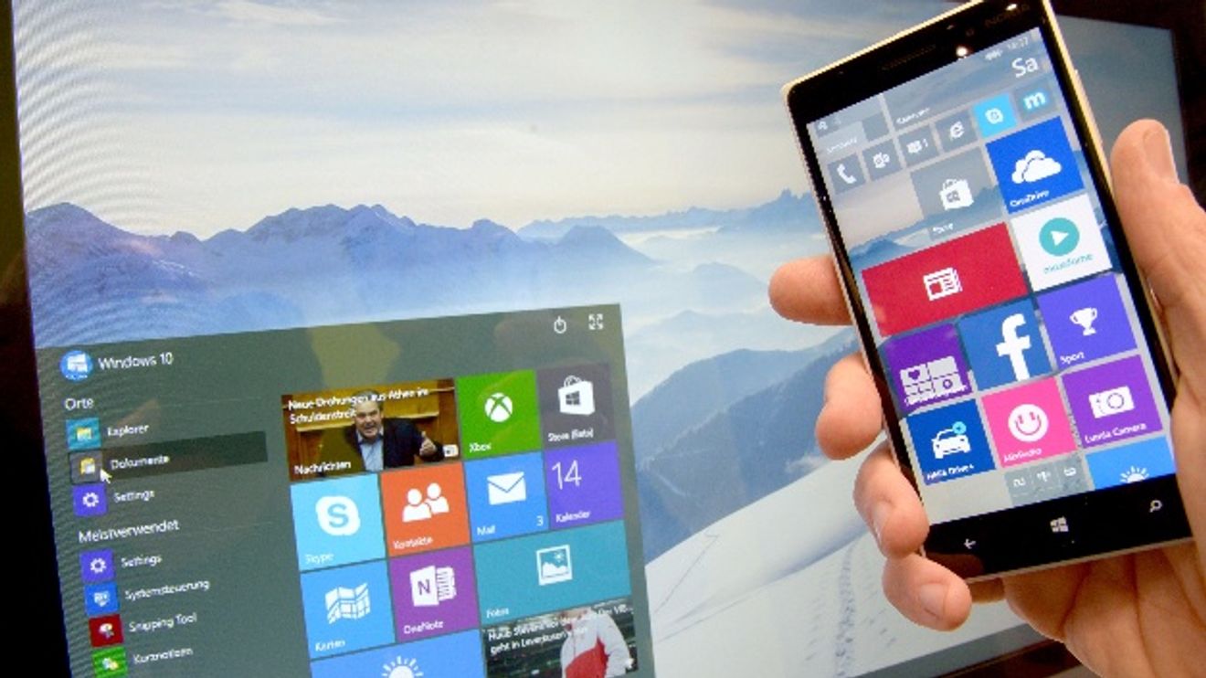 Windows 10 auf Computerbildschirm und Smartphone Windows 10 auf Computerbildschirm und Smartphone