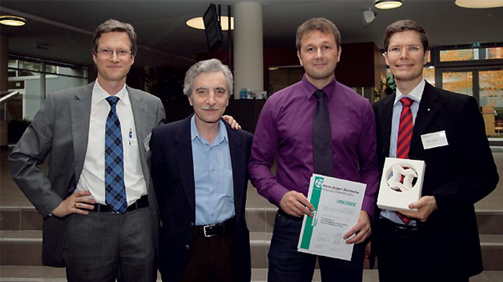 Dr. Urs Schneider, Mirsolav Miklosovic, Christoph Schneider, Dr. Oliver Schwarz, winners of the Hans Jürgen Warnecke Innovation Award 2013 Dr. Urs Schneider, Mirsolav Miklosovic, Christoph Schneider, Dr. Oliver Schwarz, winners of the Hans Jürgen Warnecke Innovation Award 2013