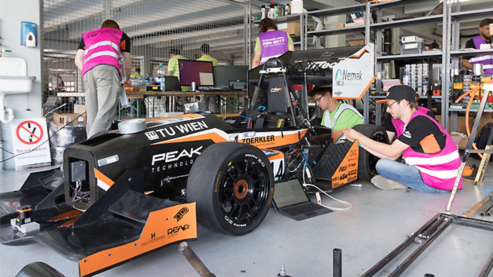 Assembling the racing car in the garage