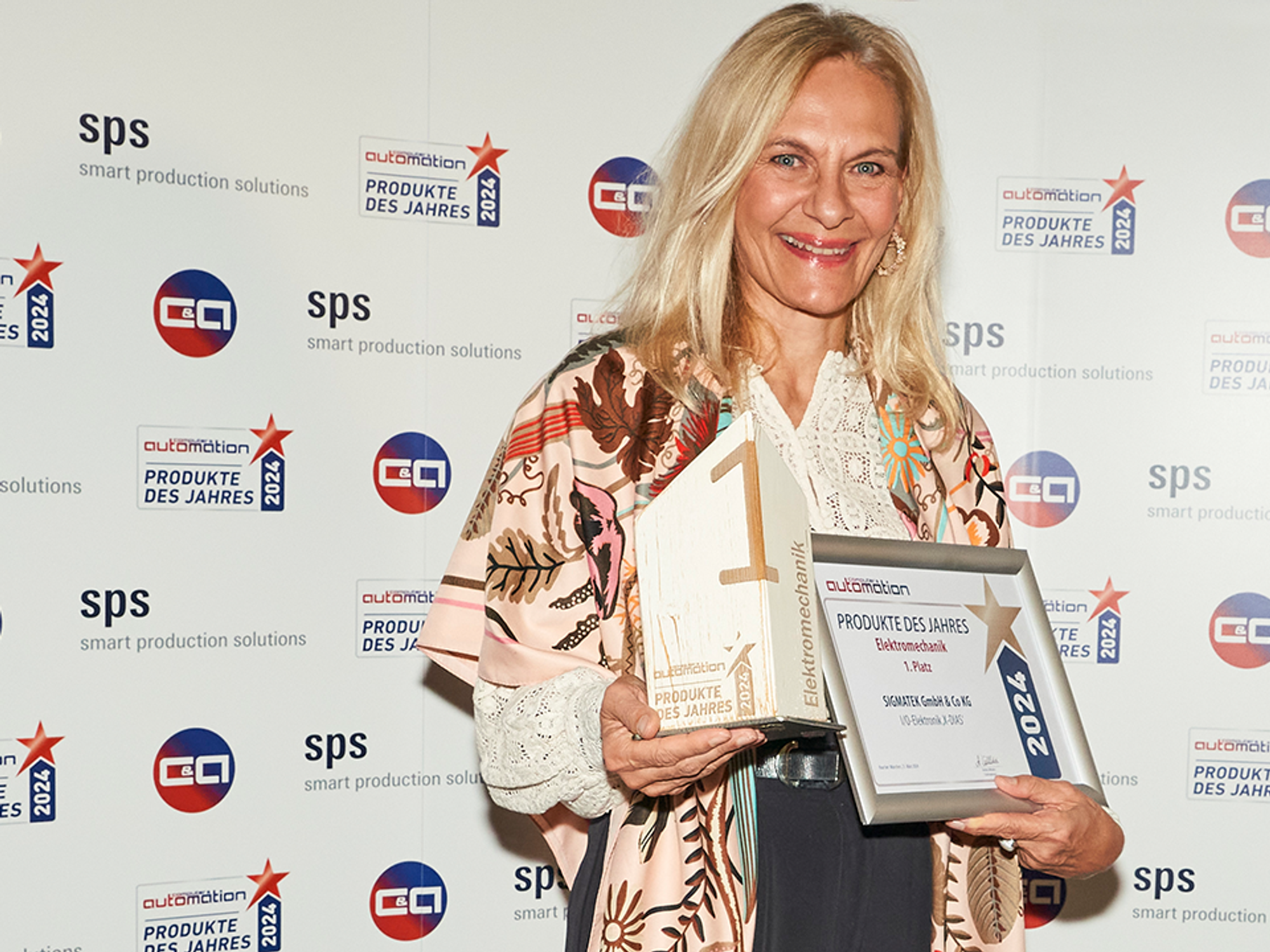 Ingrid Traintinger from Sigmatek is delighted with first place in the 'Electromechanics' category.