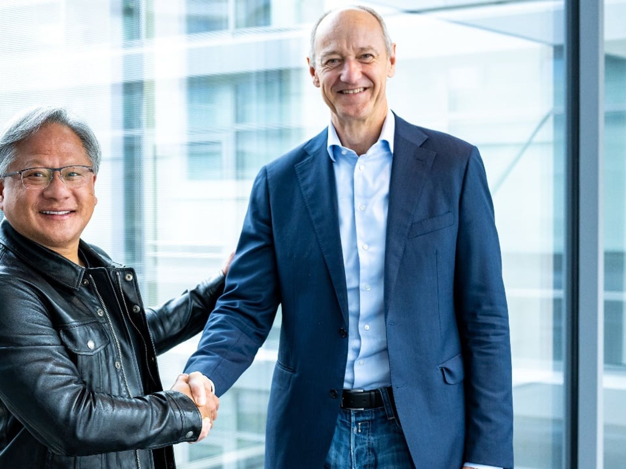 Jensen Huang, founder and CEO of Nvidia, and Roland Busch, CEO of Siemens