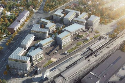 Gesamtansicht: 
Das Kronen-Einkaufszentrum samt der 
Wohnungen (Foto: Sangberg, Polyform, Werk)