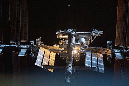 The International Space Station captured by SpaceX's Dragon Endeavour crew during a flight around the space laboratory after undocking from the Harmony module.