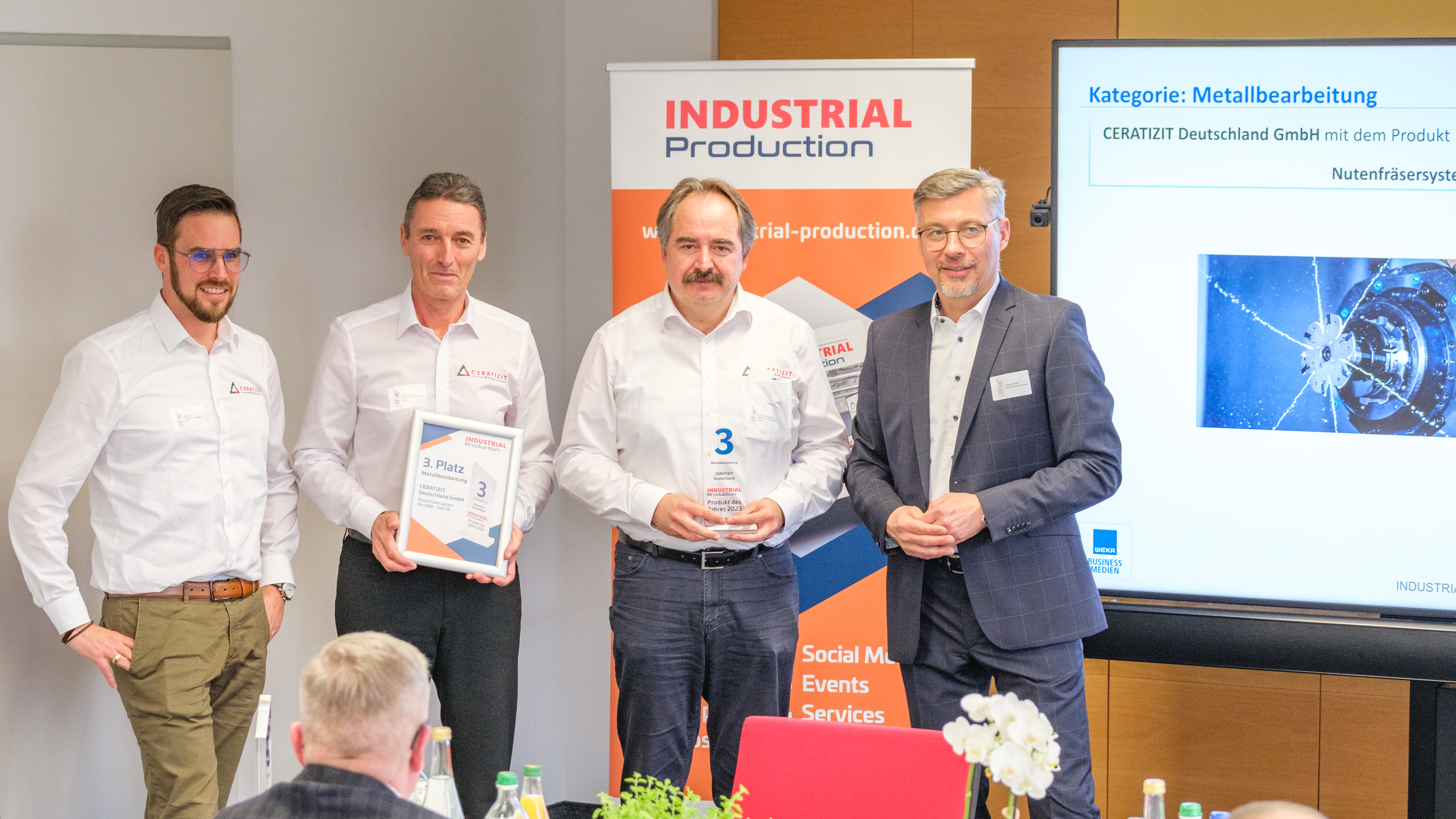 The prize was accepted by Robert Frei, Remus Venturini and Dr. Uwe Schleinkofer. 