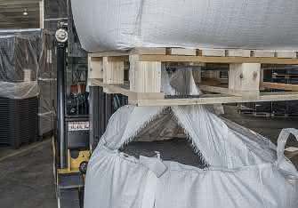 Behälter: Divider schützt Big Bags vor Gabelzinken Big Bags auf Holzpaletten