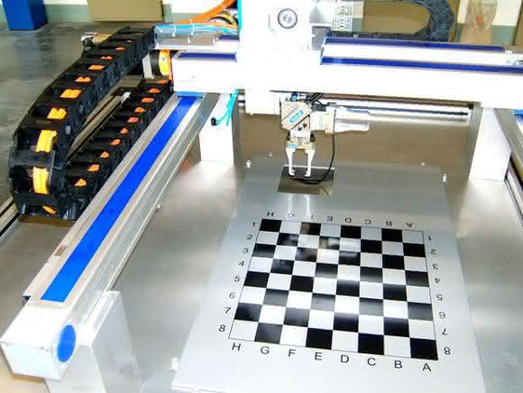 Chess-playing portal robot