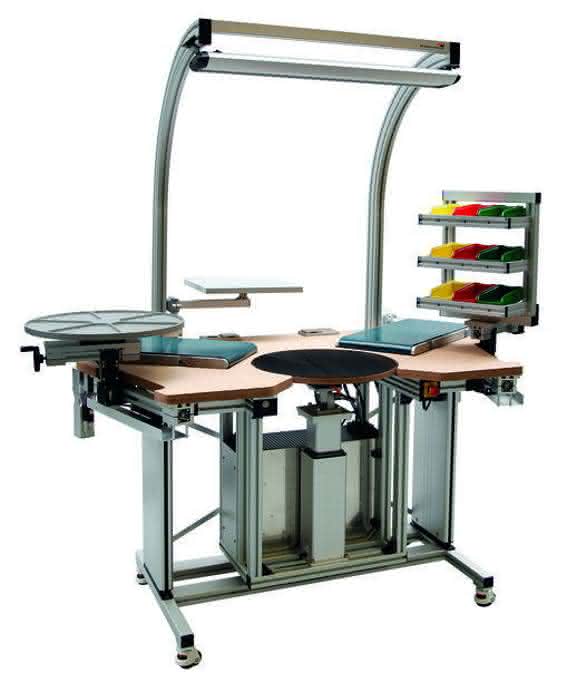 Workstation with integrated material feed