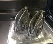 TechniaTranscat implementiert Prozesse und die passende Software, damit Metallbauteile wirtschaftlich dreidimensional gedruckt werden können. 3D-Druck von Metallbauteilen