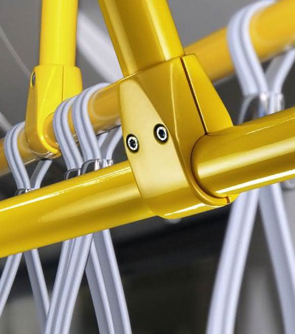 Signal yellow powder-coated pipe connectors and pipes