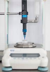 Densimeter: Dichtebestimmung mit Mikrodosierer Densimeter: Dichtebestimmung mit Mikrodosierer