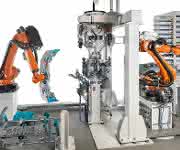 Roboterzelle: Kunststoff-Stoßfänger automatisch stanzen und verkleben Roboterzelle: Kunststoff-Stoßfänger automatisch stanzen und verkleben