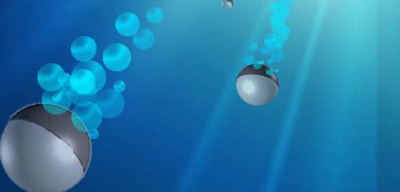 Zur dunklen Seite: Halbseitig mit Kohlenstoff beschichtete Janusteilchen, benannt nach dem doppelgesichtigen römischen Gott, navigieren von selbst von einer Lichtquelle weg. Mit diesen Mikroschwimmern ermöglichen Stuttgarter Physiker fototaktisches Verhalten, welches von vielen Mikroorganismen bekannt ist, auch in synthetisch hergestellten Systemen. (© Celia Lozano, MPI für Intelligente Systeme / Universität Stuttgart)