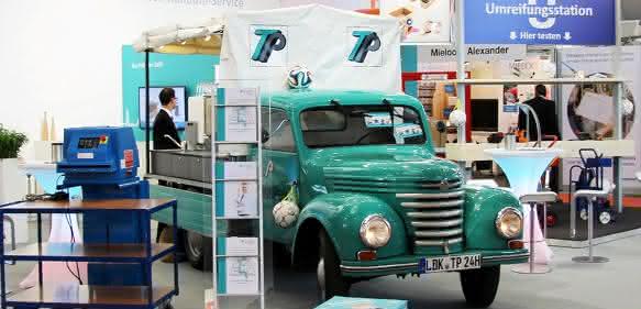 TransPak-Messestand mit umgebautem Framo TransPak-Messestand mit umgebautem Framo