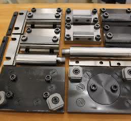 Adapterplatten, Zugstangen-Verlängerungen, Standardbacken und Grip-Backen
