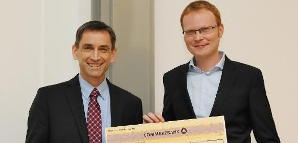 Ulrich von Hülsen und Andreas Mooser Übergabe Doktorandenpreis GSI