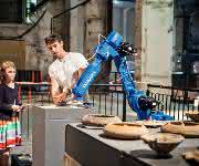 Motoman-Handlingroboter von Yaskawa als 3D-Drucker.