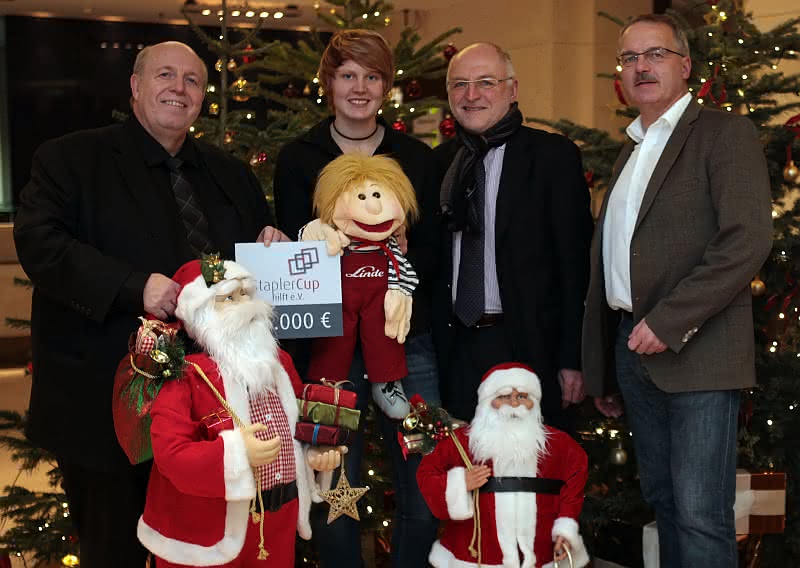 Wirtschaft + Unternehmen: Linde MH: Cup hilft Kindern mit Handicap Wirtschaft + Unternehmen: Linde MH: Cup hilft Kindern mit Handicap