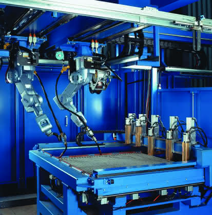 MRK + Cobots: Hinter Gittern: Flexible ­Fertigung