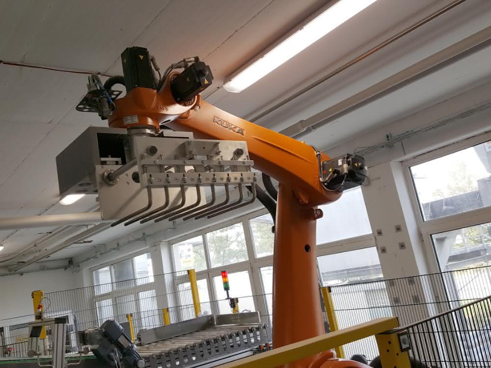 De-Man palletizing system