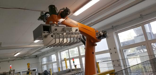 De-Man palletizing system