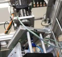 Four-axis controlled suction system